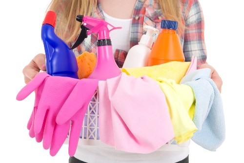 Office cleaner maintaining a professional reception area