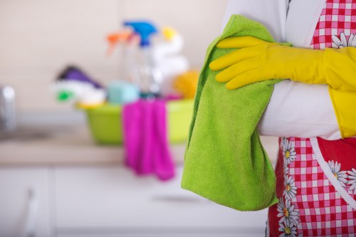 Professional housecleaningservices team following safe cleaning procedures